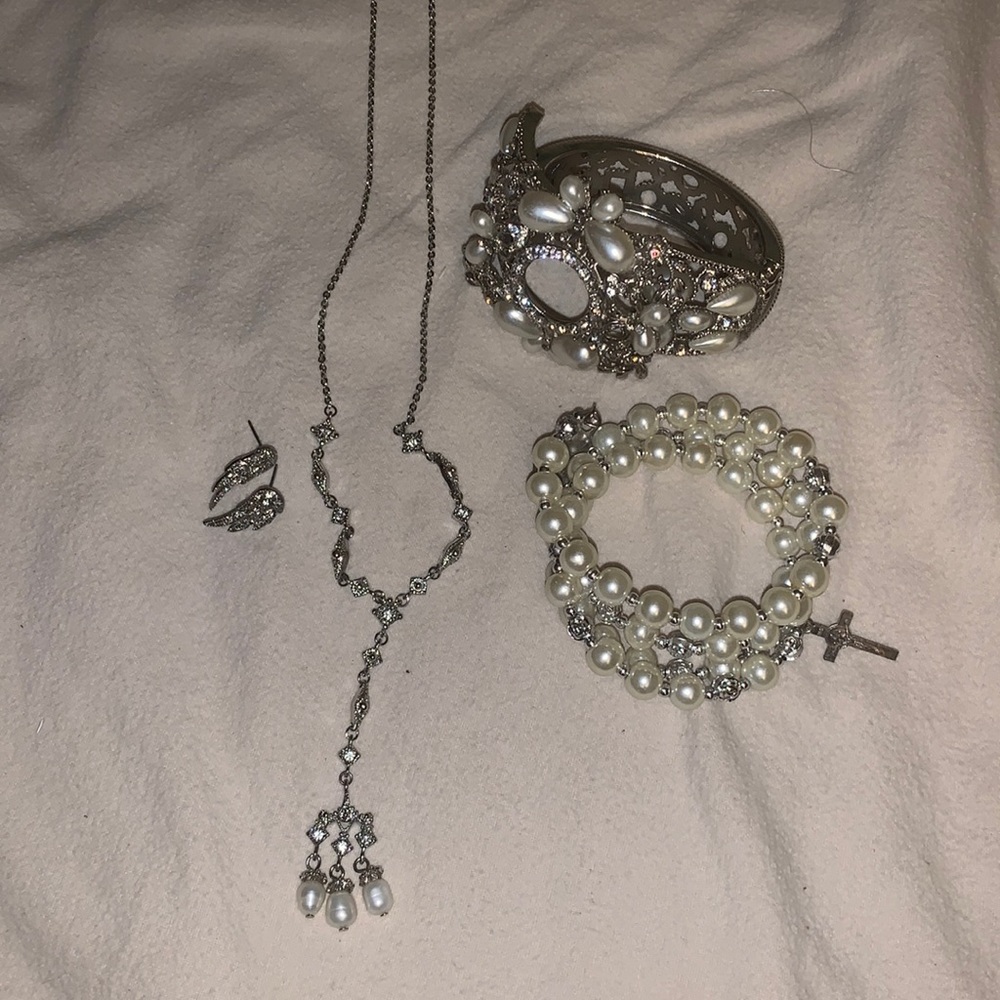 Jewelry set necklace, set of earrings and bracelet